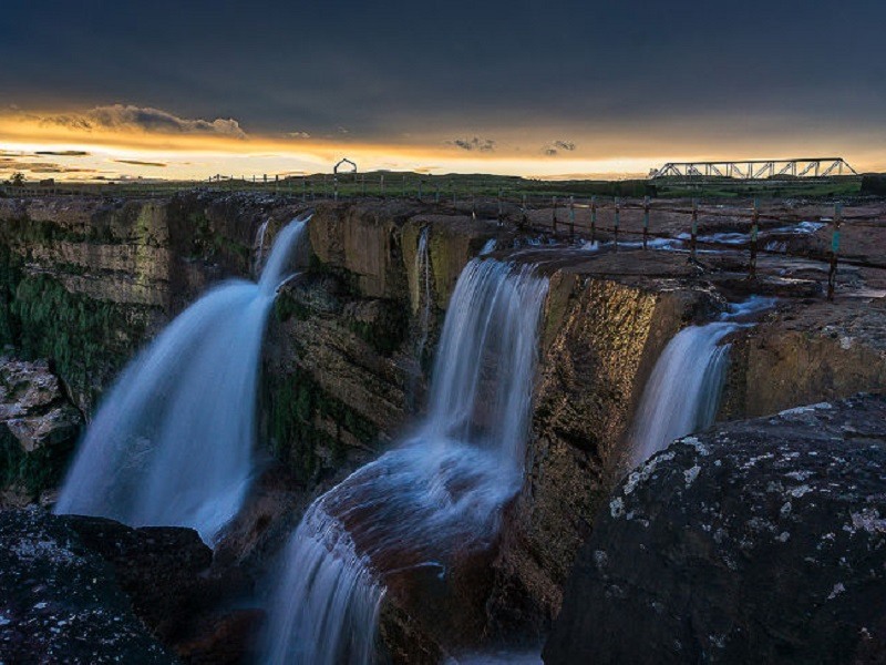 Amazing is the best word to describe what it feels like to visit Dyslane Falls, where beautiful rapids plunge from 300 feet in bubbly beauty. Not only is it a great photo opportunity, but the road to it is also a viewpoint. 