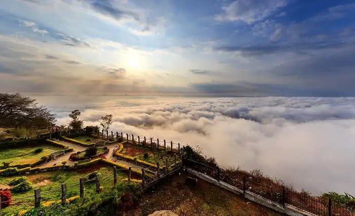 The best season to visit Nandi Hills is from March to May during the summer.